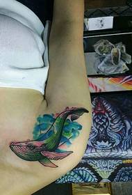 Watercolor dolphin tattoo pattern under the shoulder