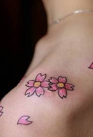 Small fresh petal tattoo tattoo in the shoulder