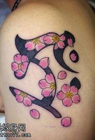 Ang pattern sa tattoo sa Sakura Sanskrit sa abaga