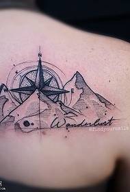 Modello tatuaggio spalla bussola collina