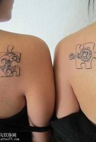 Le matagofie o le jigsaw tattoo pattern on the shoulder