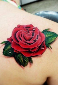 Spalla affascinante tatuaggio rosa con espressione di amore