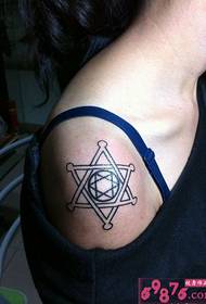 Hexagonal starburst shoulder tattoo image