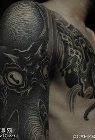 Daghang sumbanan nga tattoo sa monster sa abaga