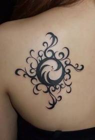 Girl back shoulder totem tattoo picture