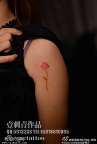 Fresh red safflower tattoo on the shoulders