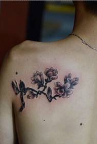 Kyawawan tattoo orchid masu kyau masu kallo a kafada na baya