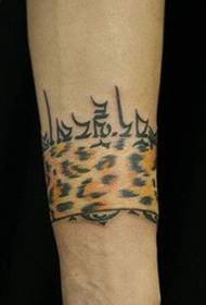 Tatù leopard fulangach