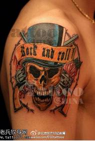 Men's shoulder skull tattoo pattern