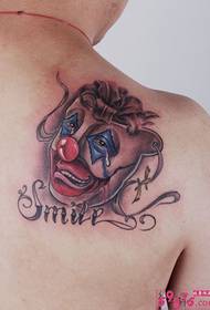 Teardrop clown kafada tattoo hoto