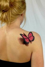 Жінка плечі приємно дивлячись малюнок малюнок татуювання тотем метелик