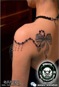 Pattern di tatuaggi archi delicati