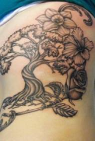 Plantera tatueringsflickans sido midja på svartgrå växt tatueringsbild