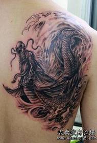 Shoulder squid tattoo