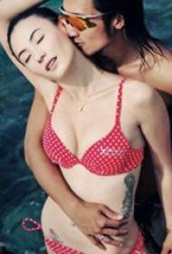 Cecilia Cheung's Tattoo Talie stelă Imagine cu tatuaj cu pene negre