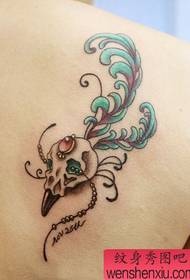 Shoulder skull feather tattoo pattern