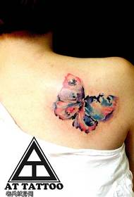 Vroulike skouerkleur spat ink vlinder tatoo patroon