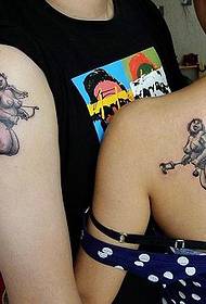 Alternative couple angel wings tattoo