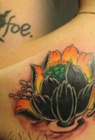 Girl's shoulders nice looking lotus tattoo pattern