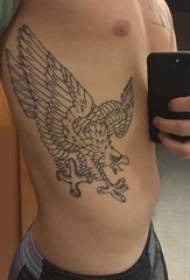 Tattoo side boy boy male waist on the picture of eagle black tattoo