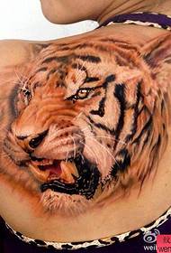 a woman's shoulder tiger tattoo pattern