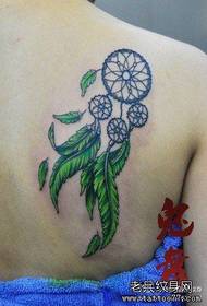Girls' shoulders look good in the popular dream catcher tattoo pattern