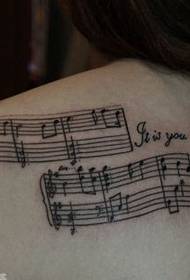 Girl shoulder totem note tattoo pattern