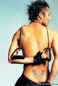 Nicholas Tse taille tattoo