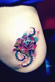 Beautiful waist small and exquisite rose flower and small skull tattoo picture