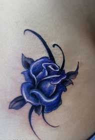 nice blue enchantress tattoo on the waist
