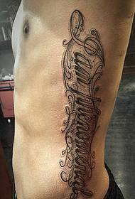 foto di tatuaggi inglesi con corpo a fiore grande in vita laterale