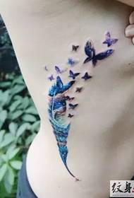 side waist dreamy feathered swallow tattoo