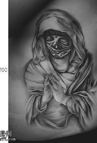 immagine del tatuaggio della Vergine Maria in vita laterale