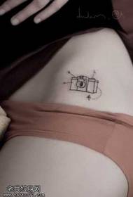 okhalweni ongu-Q okhulumela isikhulumi esincane se-tattoo