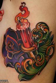 immagine tatuaggio rosa candela lato scuola vita femminile colore laterale