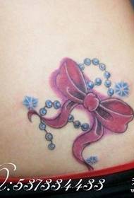disegno del tatuaggio in vita: disegno del tatuaggio con fiocco in vita
