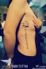 female side waist letter sailboat tattoo pattern