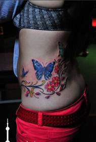 美女侧腰性感的蝴蝶花卉藤蔓纹身图图片