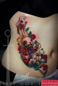 woman side waist color rabbit tattoo work