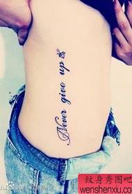 a beautiful tattoo on the side of the waist