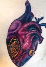 заднее цветное сердце и механическая комбинация татуировки