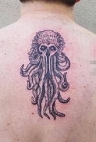anak laki-laki kembali tip prick hitam gurita hewan kecil dan gambar tato tengkorak