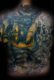 takana värillinen kallo ja Anubis-idolin tatuointikuvio