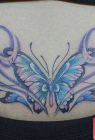värillinen perhonen tatuointikuvio tytön vyötäröllä