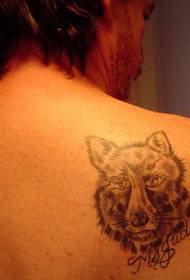 espalda silencio lobo cabeza tatuaje foto