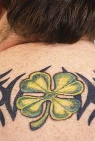 green four-leaf clover and tribal vine tattoo pattern