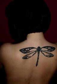 schönes und elegantes schwarzes Libellentätowierungsmuster auf der Rückseite