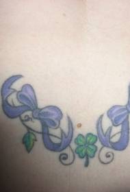 vyötärö violetti jousi ja nelinlehden apila tatuointikuvio