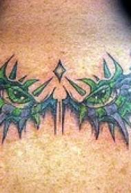 baggrønne øjne og torner tatoveringsmønster