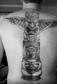 црни племенски бог статуа леђа тетоважа узорак